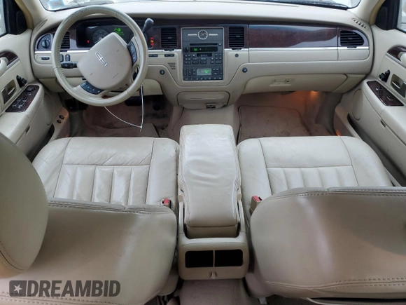 2006 Lincoln Town Car Signature z VIN 1LNHM81W76Y647607, wystawiony jako Copart lot #55507165 z przebiegiem 196 468 mil mil oraz Szkody całkowita. Historia ofert i sprzedaży dostępna na DreamBid. Obrazek 8.