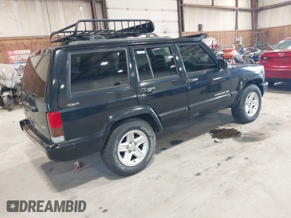 2001 Jeep Cherokee Sport z VIN 1J4FF58S11L562933, wystawiony jako IAAI lot #41944672 z przebiegiem 163 078 mil mil oraz . Historia ofert i sprzedaży dostępna na DreamBid. Obrazek 4.
