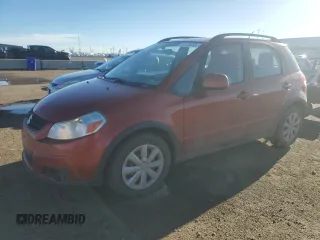 2011 Suzuki SX4 Crossover z VIN JS2YB5A33B6301113, wystawiony jako Copart lot #57125635 z przebiegiem 154 425 mil mil oraz Szkoda całkowita • Salvage title. Historia ofert i sprzedaży dostępna na DreamBid. Obrazek 1.