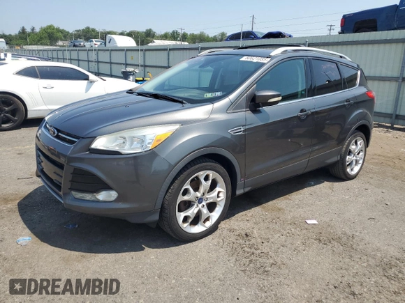 2015 Ford Escape Titanium z VIN 1FMCU9J97FUA38731, wystawiony jako Copart lot #60621085 z przebiegiem 119 704 mil mil oraz Szkoda całkowita • Salvage title. Historia ofert i sprzedaży dostępna na DreamBid. Obrazek 1.