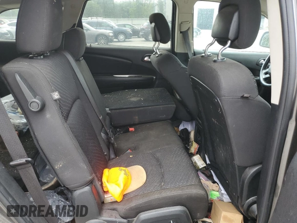 2017 Dodge Journey SXT with VIN 3C4PDCBG7HT510231, listed as a Copart auction lot 56735015 with 168,312 mi miles and Salvage title. Bid and sale history available at DreamBid. Image 11.