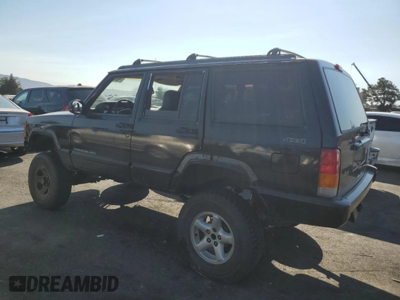 1998 Jeep Cherokee Sport with VIN 1J4FT68S8WL134461, listed as a Copart auction lot 74005704 with 0 mi miles and Salvage Title. Bid and sale history available at carsss.com. Image 2.
