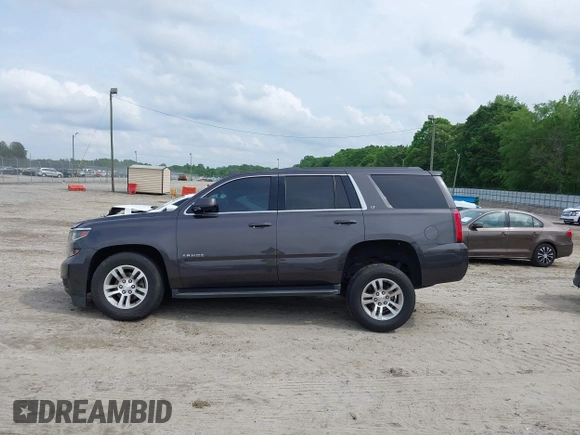 2018 Chevrolet Tahoe LT with VIN 1GNSKBKCXJR103730, listed as a IAAI auction lot 42125208 with 212,360 mi miles and . Bid and sale history available at DreamBid. Image 14.