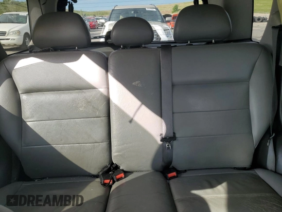 2005 Ford Escape Hybrid z VIN 1FMCU95HX5KE24619, wystawiony jako Copart lot #60624765 z przebiegiem 209 937 mil mil oraz Nie do naprawy • Non repairable. Historia ofert i sprzedaży dostępna na DreamBid. Obrazek 10.