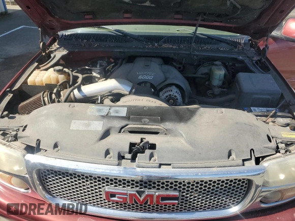 2002 GMC Yukon Denali z VIN 1GKEK63U02J118522, wystawiony jako Copart lot #52031995 z przebiegiem 166 332 mil mil oraz Szkoda całkowita • Salvage title. Historia ofert i sprzedaży dostępna na DreamBid. Obrazek 12.