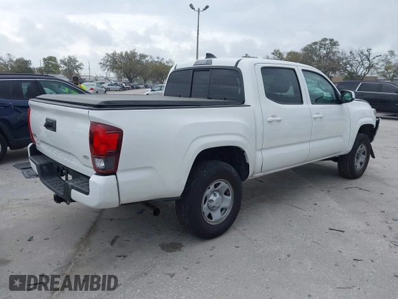 2022 Toyota Tacoma SR with VIN 3TMCZ5AN7NM470444, listed as a IAAI auction lot 41729041 with 34,248 mi miles and . Bid and sale history available at DreamBid. Image 4.