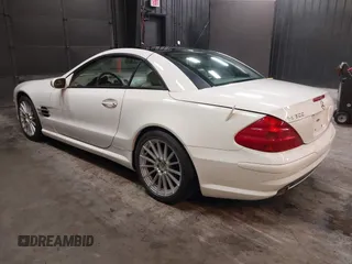 2004 Mercedes-Benz SL 500 z VIN WDBSK75F74F072792, wystawiony jako IAAI lot #42415790 z przebiegiem 66 100 mil mil oraz . Historia ofert i sprzedaży dostępna na DreamBid. Obrazek 3.