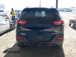 2015 Jeep Cherokee Trailhawk with VIN 1C4PJMBB1FW520649, listed as a IAAI auction lot 41991904 with 168,533 mi miles and . Bid and sale history available at DreamBid. Image 17.