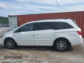 2011 Honda Odyssey EX-L with VIN 5FNRL5H60BB026171, listed as a IAAI auction lot 42511296 with 288,827 mi miles and . Bid and sale history available at DreamBid. Image 14.