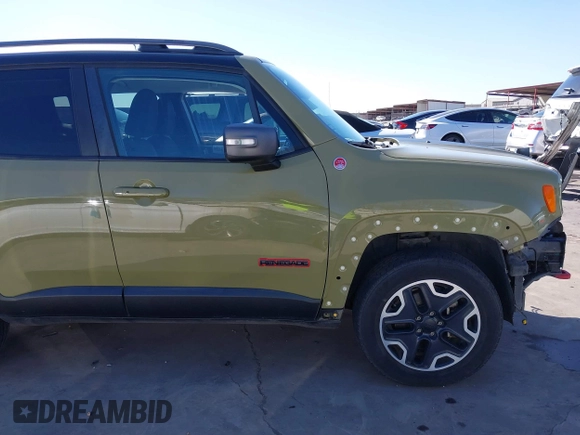 2015 Jeep Renegade Trailhawk with VIN ZACCJBCT6FPC11721, listed as a IAAI auction lot 41759053 with 95,499 mi miles and . Bid and sale history available at DreamBid. Image 20.
