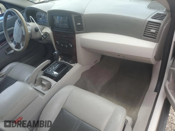2007 Jeep Grand Cherokee Limited with VIN 1J8HR58267C610403, listed as a Copart auction lot 60759045 with 158,878 mi miles and Salvage title. Bid and sale history available at DreamBid. Image 8.