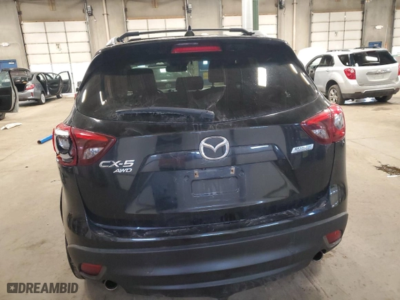 2016 Mazda CX-5 Grand Touring with VIN JM3KE4DY2G0720788, listed as a Copart auction lot 48102955 with 96,527 mi miles and Salvage Title. Bid and sale history available at carsss.com. Image 6.