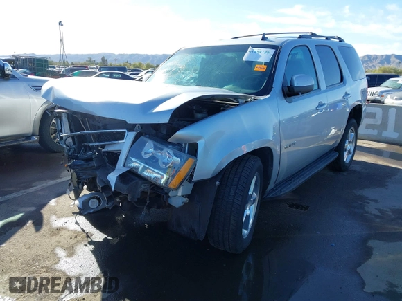2013 Chevrolet Tahoe LT with VIN 1GNSKBE01DR157083, listed as a IAAI auction lot 41759189 with 153,403 mi miles and . Bid and sale history available at DreamBid. Image 18.