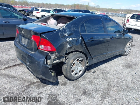 2007 Honda Civic Sdn LX with VIN 1HGFA16577L134935, listed as a IAAI auction lot 41975087 with 255,338 mi miles. Bid and sale history available at carsss.com. Image 4.