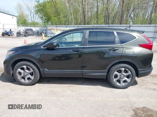 2018 Honda CR-V EX-L z VIN 7FARW2H82JE021578, wystawiony jako IAAI lot #42215280 z przebiegiem 82 571 mil mil oraz . Historia ofert i sprzedaży dostępna na DreamBid. Obrazek 14.