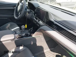 2025 Toyota Camry LE with VIN 4T1DAACK9SU084957, listed as a IAAI auction lot 41688859 with 7,396 mi miles and . Bid and sale history available at DreamBid. Image 5.