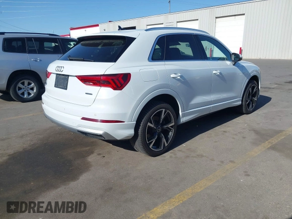 2019 Audi Q3 Premium z VIN WA1AECF32K1072625, wystawiony jako IAAI lot #42326866 z przebiegiem 67 351 mil mil oraz . Historia ofert i sprzedaży dostępna na DreamBid. Obrazek 4.