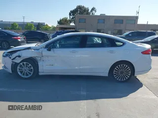 2017 Ford Fusion Hybrid Titanium с VIN 3FA6P0RU3HR323164, выставлен на аукционе IAAI как лот 42303571 с пробегом 119 732 миль миль и . История ставок и продаж доступна на DreamBid. Изображение 15.
