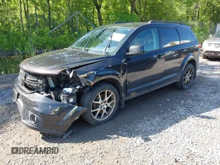2013 Dodge Journey R/T with VIN 3C4PDDEG4DT691056, listed as a IAAI auction lot 42535196 with 198,307 mi miles and . Bid and sale history available at DreamBid. Image 17.