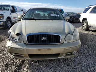 2004 Hyundai Sonata with VIN KMHWF25S44A973750, listed as a Copart auction lot 84761474 with 163,040 mi miles and Salvage Title. Bid and sale history available at carsss.com. Image 5.