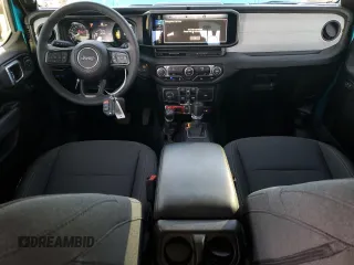 2024 Jeep Wrangler Willys z VIN 1C4RJXN67RW218280, wystawiony jako Copart lot #53845845 z przebiegiem 5 281 mil mil oraz Szkoda całkowita • Salvage title. Historia ofert i sprzedaży dostępna na DreamBid. Obrazek 8.