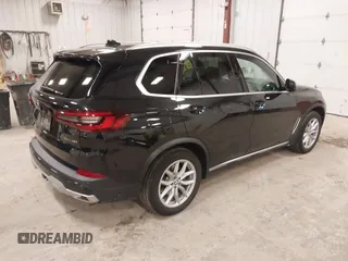 2023 BMW X5 xDrive40i with VIN 5UXCR6C08P9R88991, listed as a IAAI auction lot 41965881 with 33,136 mi miles. Bid and sale history available at carsss.com. Image 4.