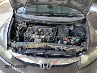2009 Honda Civic LX z VIN 2HGFA16549H540512, wystawiony jako Copart lot #55950785 z przebiegiem 156 950 mil mil oraz Szkoda całkowita • Salvage title. Historia ofert i sprzedaży dostępna na DreamBid. Obrazek 11.