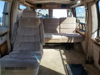1997 GMC Savana with VIN 1GDFG15R9V1010302, listed as a Copart auction lot 88069445 with 242,106 mi miles and Salvage Title. Bid and sale history available at carsss.com. Image 10.