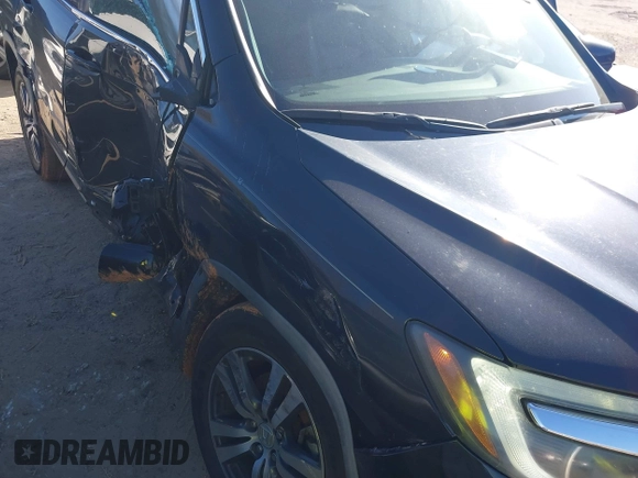 2016 Honda Pilot EX-L with VIN 5FNYF5H59GB005482, listed as a IAAI auction lot 41304248 with 127,092 mi miles and . Bid and sale history available at DreamBid. Image 6.