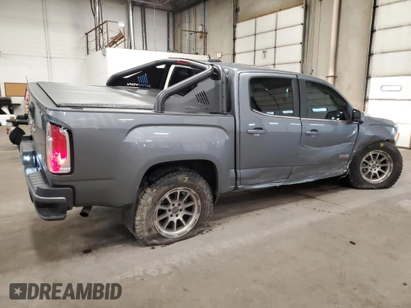 2020 GMC Canyon 4WD All Terrain w/Cloth with VIN 1GTG6FEN0L1123672, listed as a Copart auction lot 69202764 with 74,795 mi miles and Salvage Title. Bid and sale history available at carsss.com. Image 3.