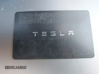2023 Tesla Model Y Long Range with VIN 7SAYGAEEXPF714760, listed as a IAAI auction lot 41748398 with 49,802 mi miles and . Bid and sale history available at DreamBid. Image 11.