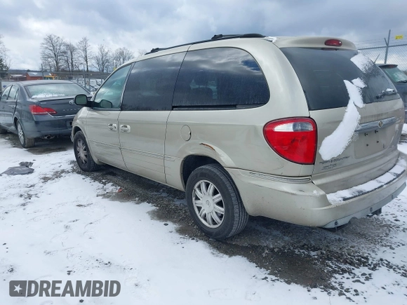 2006 Chrysler Town & Country LWB Touring with VIN 2A8GP54L86R887561, listed as a IAAI auction lot 41235389 with 124,554 mi miles. Bid and sale history available at carsss.com. Image 3.