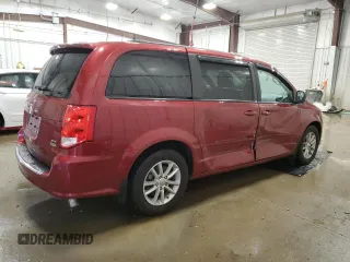 2014 Dodge Grand Caravan SXT z VIN 2C4RDGCG2ER239110, wystawiony jako Copart lot #57247855 z przebiegiem 94 126 mil mil oraz Nie do naprawy. Historia ofert i sprzedaży dostępna na DreamBid. Obrazek 3.