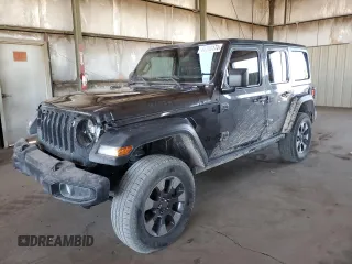 2021 Jeep Wrangler Unlimited Freedom with VIN 1C4HJXDG0MW648666, listed as a Copart auction lot 84260174 with 39,021 mi miles and Salvage title. Bid and sale history available at DreamBid. Image 1.