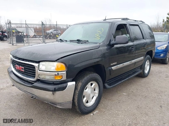 2005 GMC Yukon SLT with VIN 1GKEK13T75R101670, listed as a IAAI auction lot 41490519 with 168,998 mi miles. Bid and sale history available at carsss.com. Image 2.