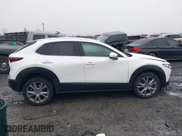 2021 Mazda CX-30 Select with VIN 3MVDMBBL3MM205256, listed as a IAAI auction lot 41302313 with 17,709 mi miles and . Bid and sale history available at DreamBid. Image 14.
