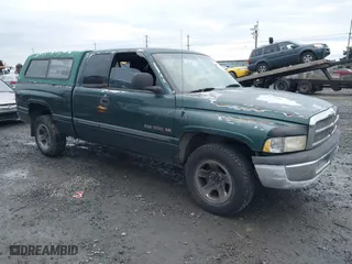 2000 Dodge Ram 1500 with VIN 3B7HC13Z6YG120189, listed as a IAAI auction lot 41143429 with 171,604 mi miles. Bid and sale history available at carsss.com. Image 1.