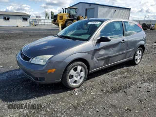 2007 Ford Focus S z VIN 1FAHP31N67W217267, wystawiony jako Copart lot #57886985 z przebiegiem 107 244 mil mil oraz Szkoda całkowita • Salvage title. Historia ofert i sprzedaży dostępna na DreamBid. Obrazek 1.