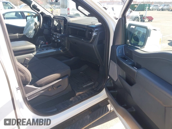 2023 Ford F-150 XL with VIN 1FTFW1ED0PFA18306, listed as a IAAI auction lot 41690965 with 49,988 mi miles. Bid and sale history available at carsss.com. Image 5.