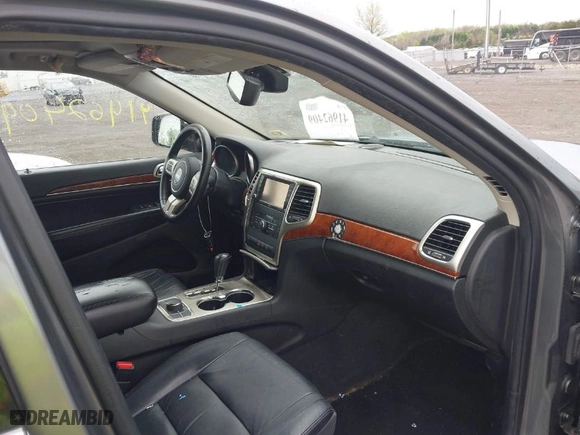2012 Jeep Grand Cherokee Limited with VIN 1C4RJFBG0CC254425, listed as a IAAI auction lot 41962409 with 256,894 mi miles. Bid and sale history available at carsss.com. Image 5.