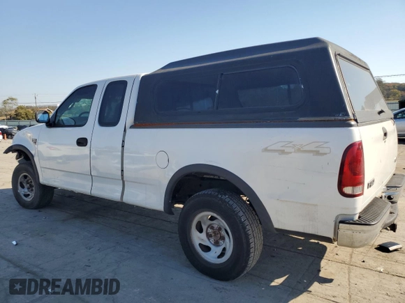 2000 Ford F-150 XL with VIN 1FTRX18W2YNC34320, listed as a Copart auction lot 77832404 with 217,448 mi miles and Clean Title. Bid and sale history available at carsss.com. Image 2.