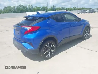 2018 Toyota C-HR XLE z VIN NMTKHMBX5JR057407, wystawiony jako IAAI lot #42363412 z przebiegiem 155 673 mil mil oraz . Historia ofert i sprzedaży dostępna na DreamBid. Obrazek 4.
