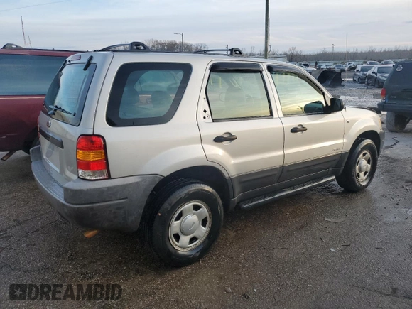 2002 Ford Escape XLS Choice with VIN 1FMYU01162KC61229, listed as a Copart auction lot 41985085 with 74,203 mi miles and Salvage title. Bid and sale history available at DreamBid. Image 3.