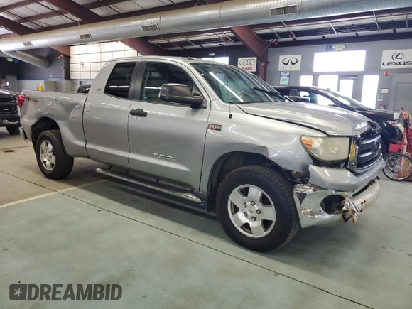 2010 Toyota Tundra 4WD Truck with VIN 5TFUY5F14AX138690, listed as a Copart auction lot 70699574 with 207,326 mi miles and Clean Title. Bid and sale history available at carsss.com. Image 4.