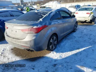 2013 Hyundai Elantra Coupe SE with VIN KMHDH6AE8DU009840, listed as a IAAI auction lot 41409231 with 176,445 mi miles. Bid and sale history available at carsss.com. Image 4.