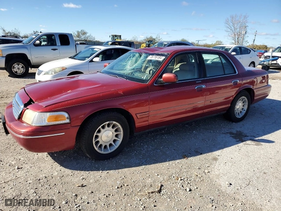 1998 Ford Crown Victoria LX with VIN 2FAFP74W4WX118422, listed as a Copart auction lot 78716184 with 70,214 mi miles and Salvage Title. Bid and sale history available at carsss.com. Image 1.