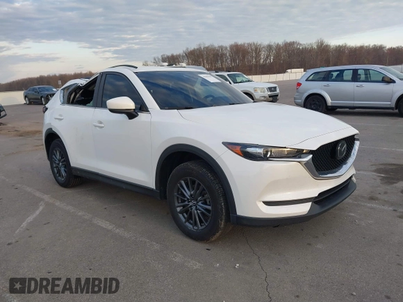 2019 Mazda CX-5 Sport with VIN JM3KFABMXK1655302, listed as a IAAI auction lot 41901293 with 140,369 mi miles and . Bid and sale history available at DreamBid. Image 1.