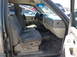 2002 Chevrolet Tahoe LS z VIN 1GNEC13V92R305304, wystawiony jako IAAI lot #41851210 z przebiegiem Nie podano mil oraz . Historia ofert i sprzedaży dostępna na DreamBid. Obrazek 5.