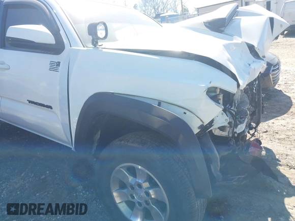 2018 Toyota Tacoma SR with VIN 5TFCZ5AN6JX144056, listed as a IAAI auction lot 41623760 with Not Provided miles and . Bid and sale history available at DreamBid. Image 18.