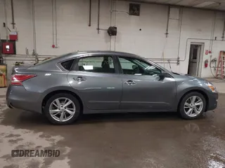 2015 Nissan Altima SL z VIN 1N4AL3AP2FC409445, wystawiony jako IAAI lot #42335870 z przebiegiem 101 346 mil mil oraz . Historia ofert i sprzedaży dostępna na DreamBid. Obrazek 13.